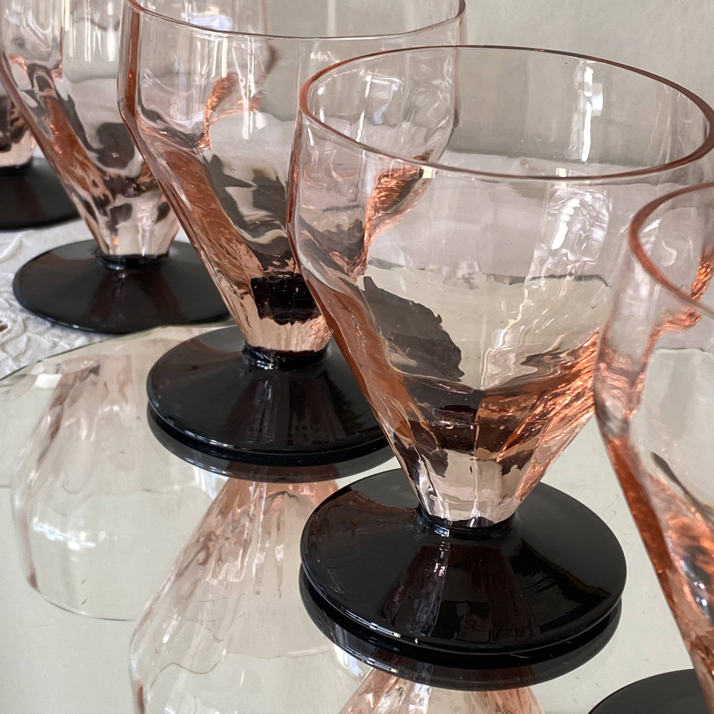6 Art Deco pink wine or water glasses with black stems.
