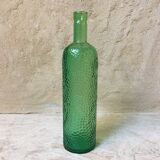 Textured glass wine bottle