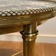 Round coffee table in brass with a marble top from the Ramsay house.