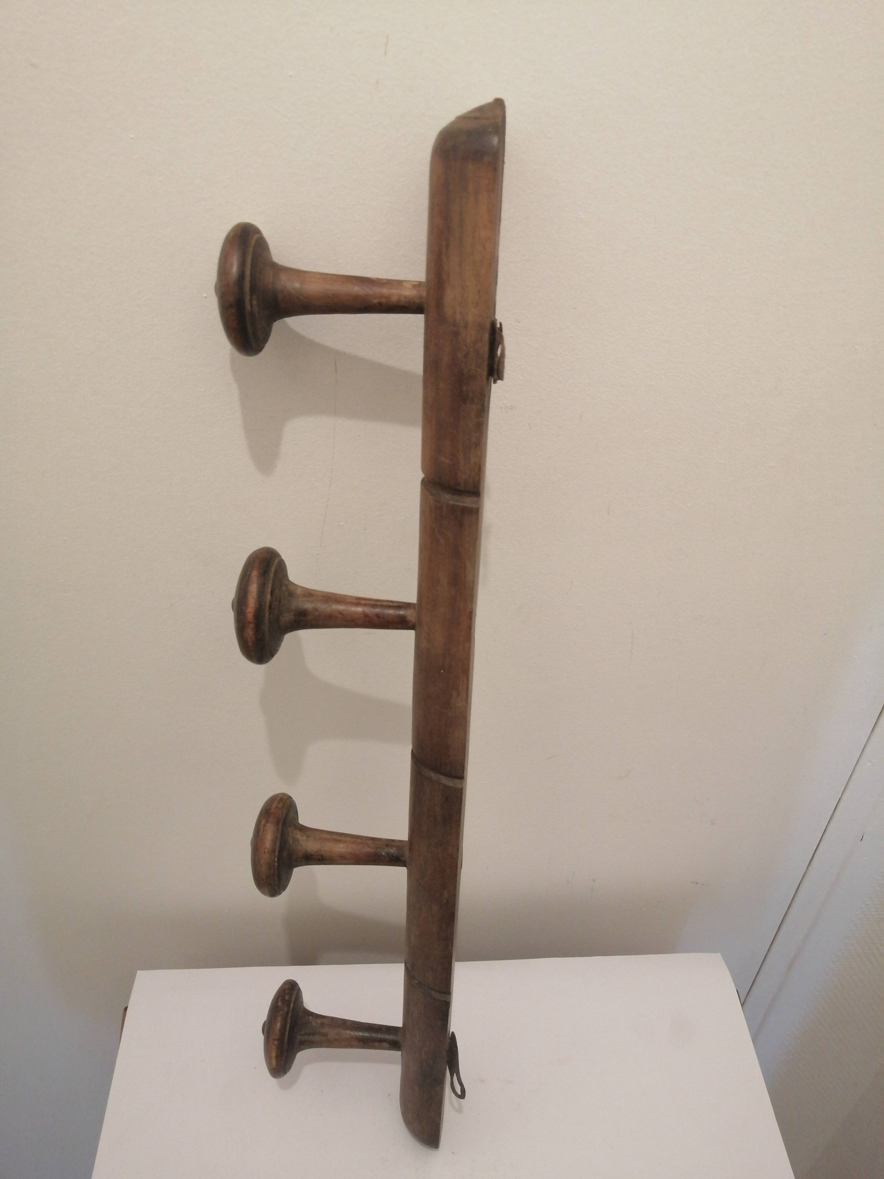 Vintage wooden coat rack with 4 hooks