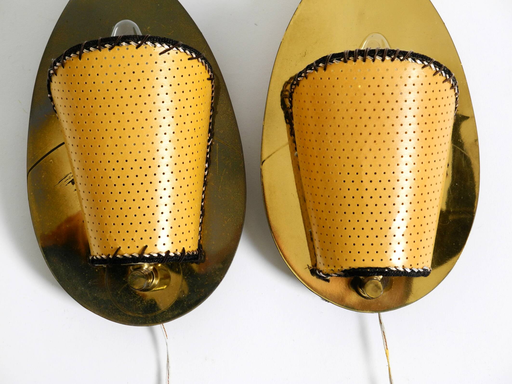 Two enchanting original Mid Century Modern brass wall lamps