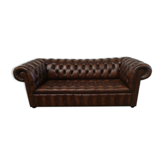 Light brown leather chesterfield sofa upholstered