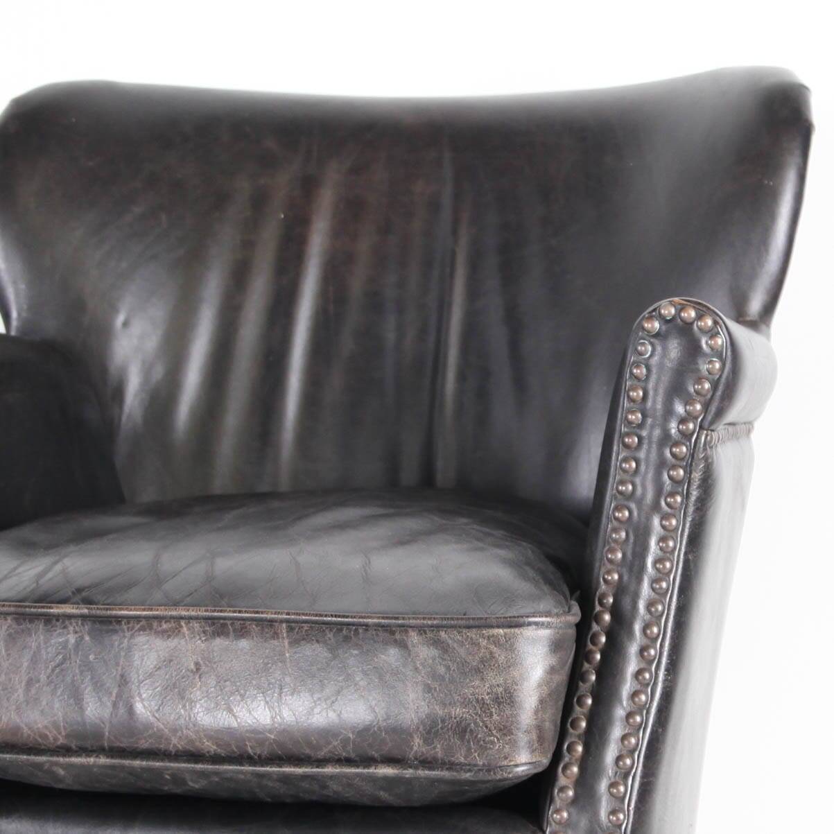 Pair of small leather club armchairs