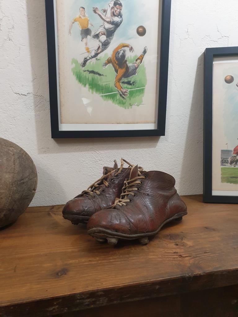Pair of old football boots, vintage sport