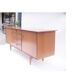 Vintage Scandinavian sideboard with an overflowing top.