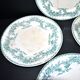 Onnaing Faïencerie set of 4 Coppelia plates with green floral decoration, iron earthenware