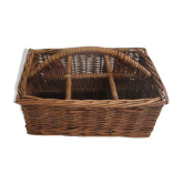Basket carries glasses or cutlery in wicker.