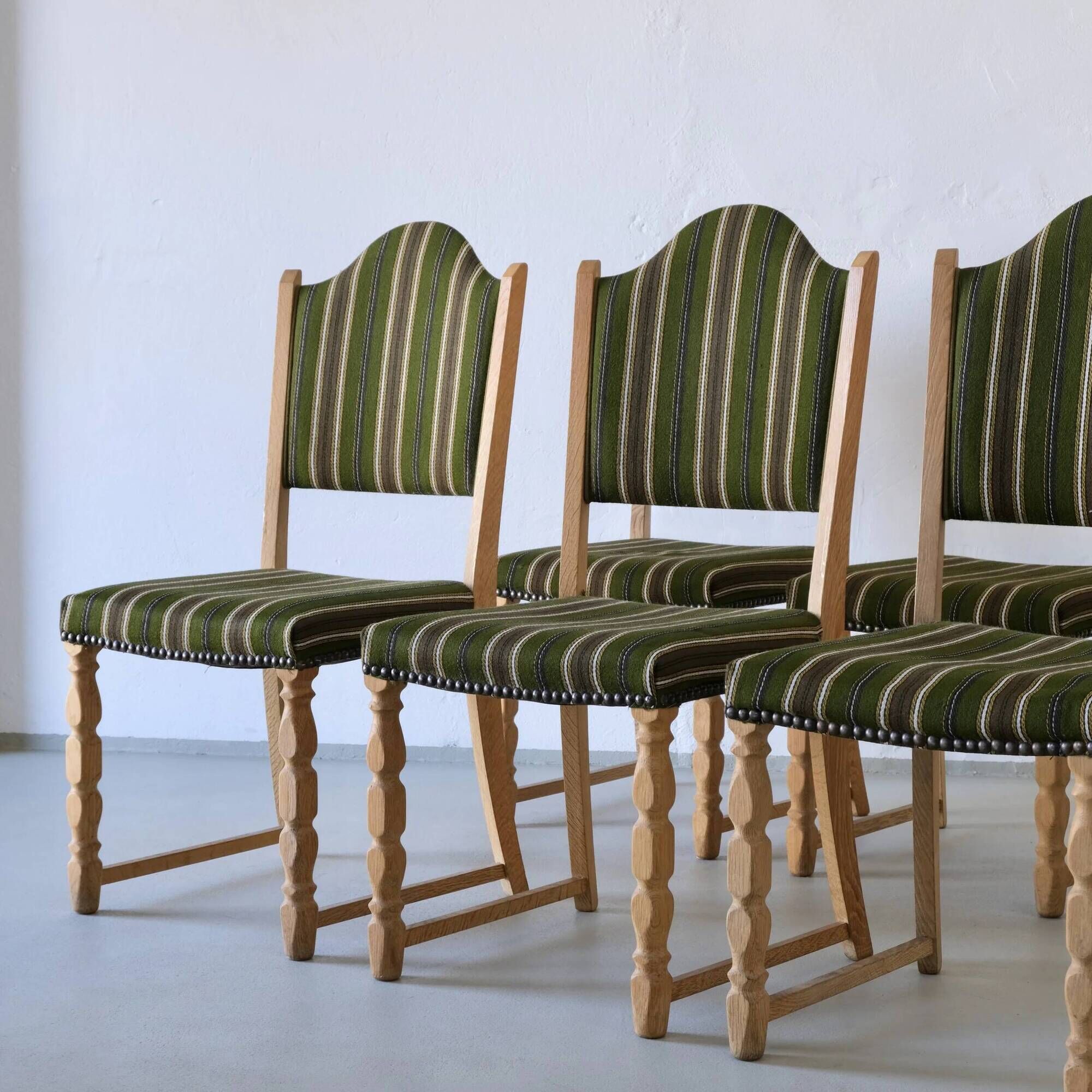 Henning Kjaernulf carved oak dining chairs | set of 6 | Denmark | 1950s