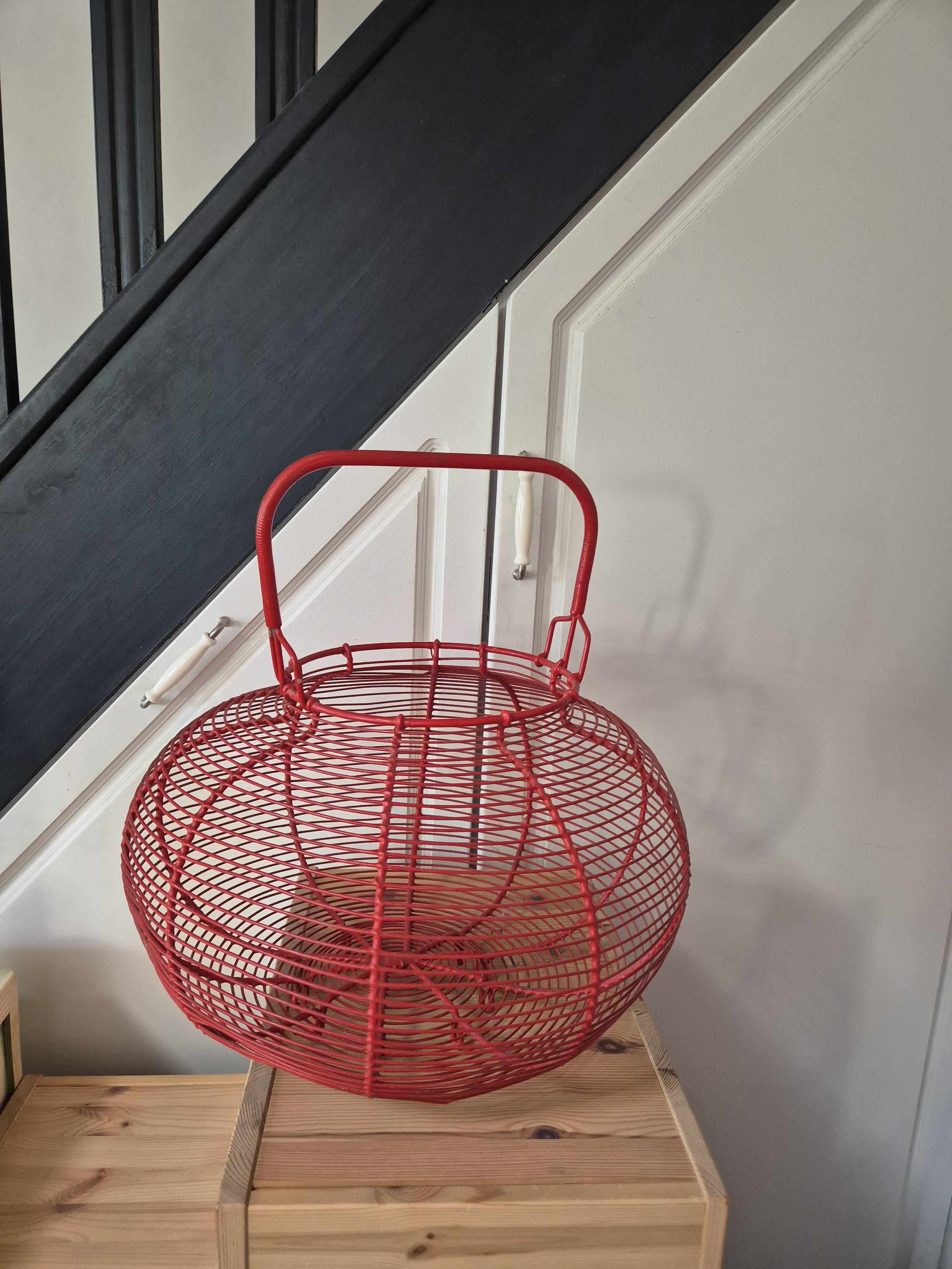 very large vintage red metal basket with handle