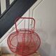 very large vintage red metal basket with handle