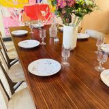 Desk that can serve as a dining table.