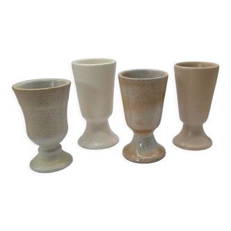 Set 4 mismatched beige cups