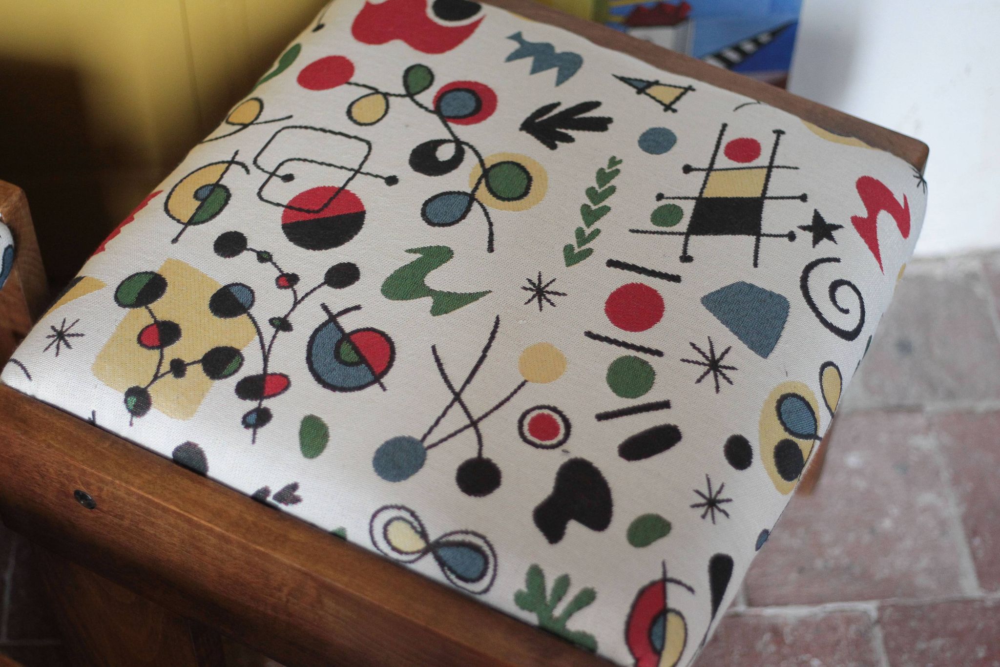 Set of 3 beech wood stools with fabric upholstery in the style of Miro.