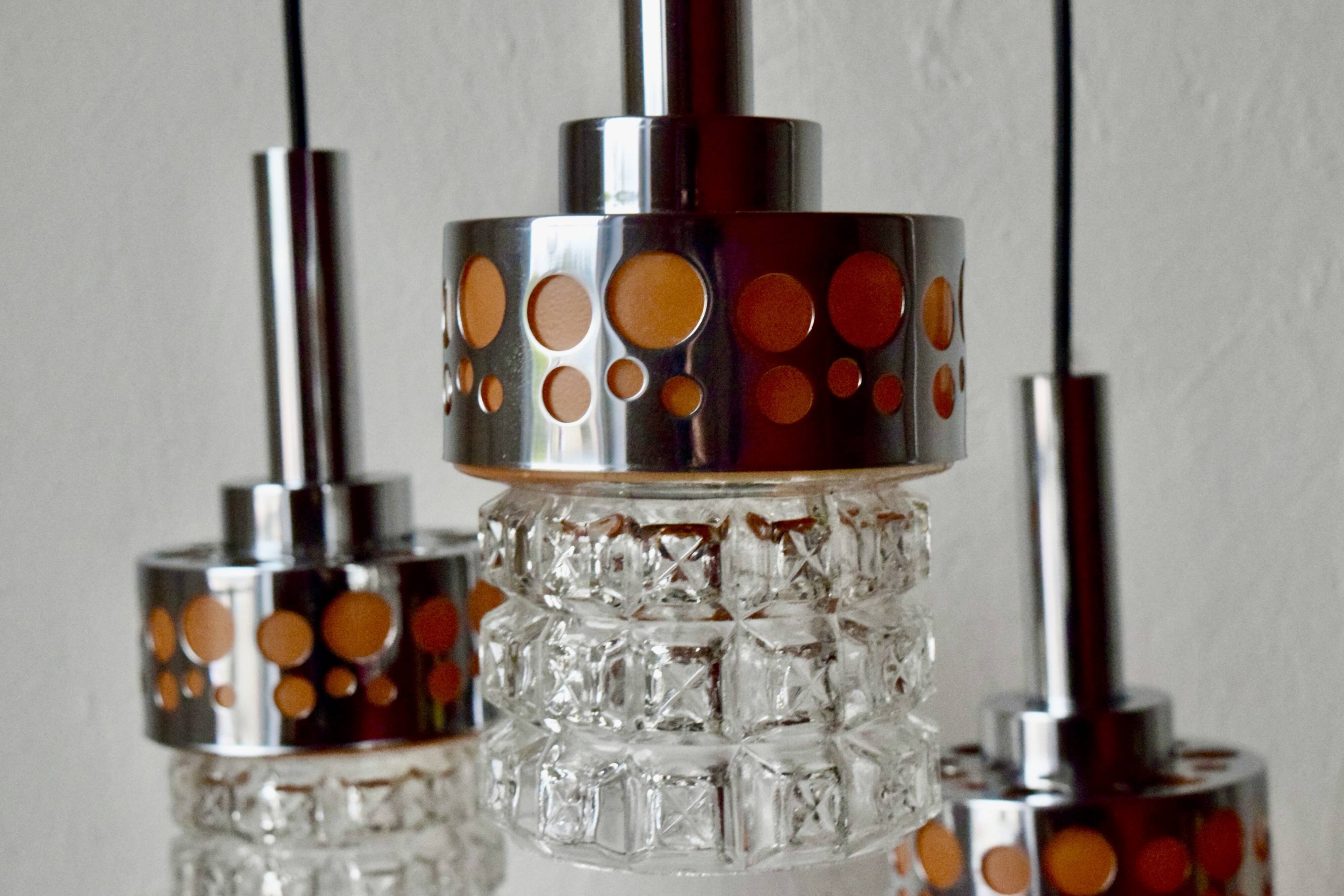 Triple vintage pendant light in molded glass, chrome metal and orange plastic - Space Age Design