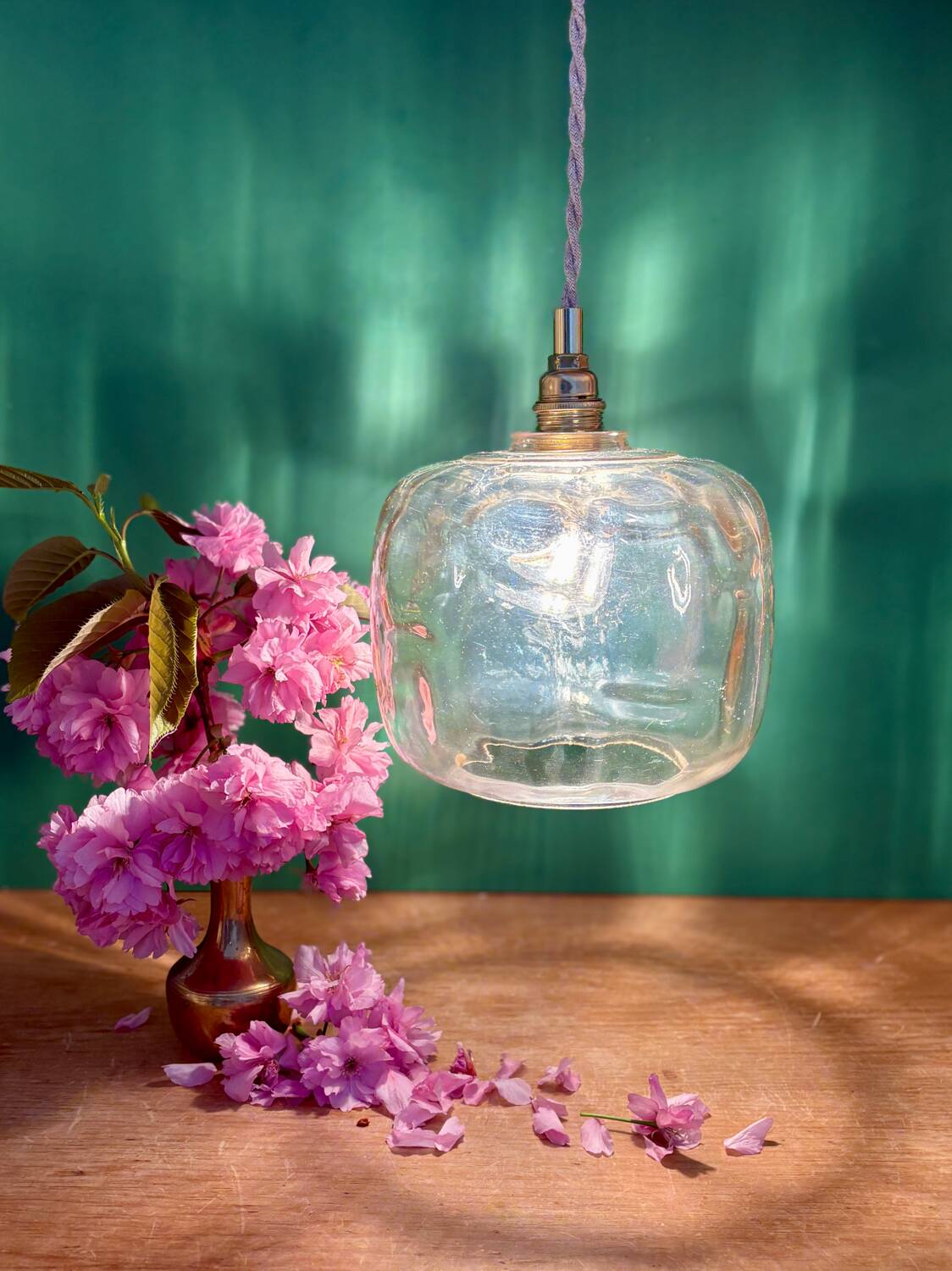 Suspension globe vintage en verre ambré