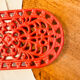 Enamelled cast iron trivet