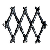 Napoleon III hinged wall-mounted coat rack in black wood