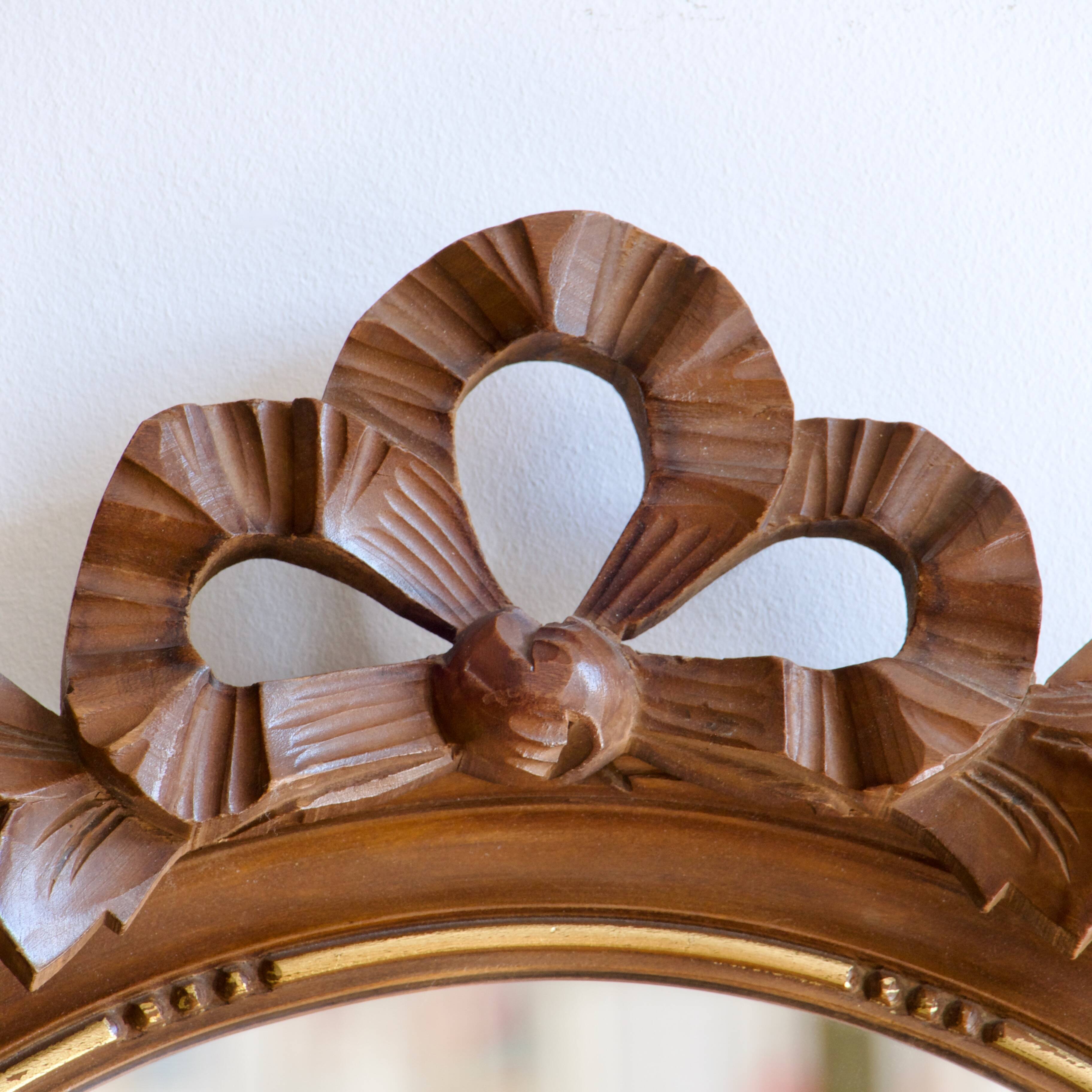 Gustavian knot hand carved oval wooden mirror