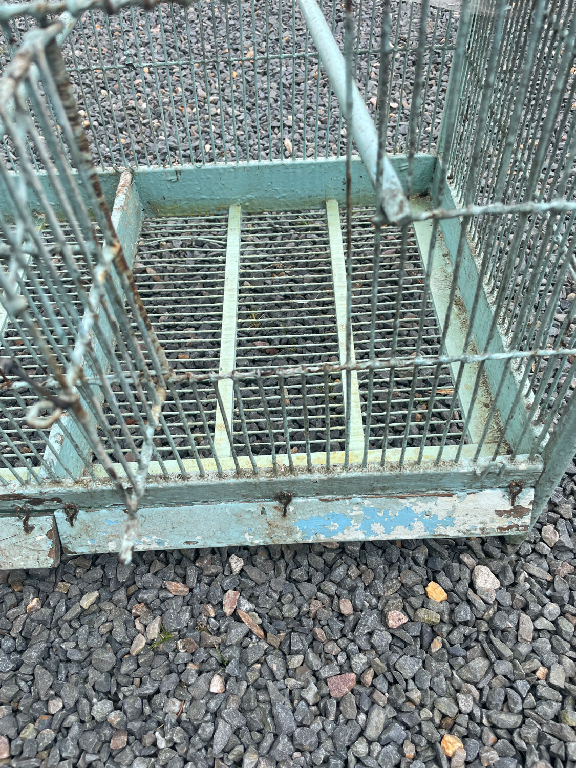 Old wooden and metal birdcage