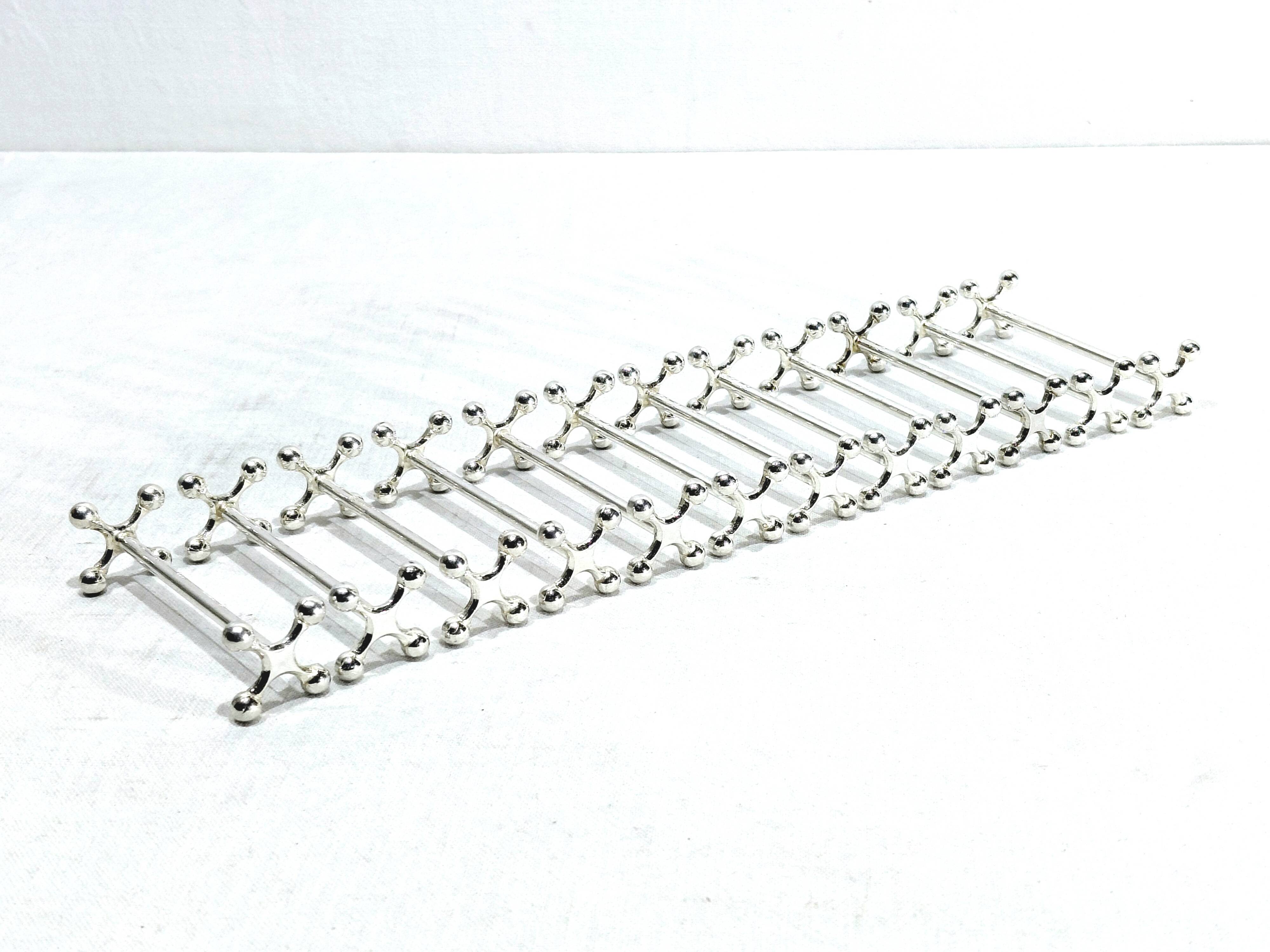 CHRISTOFLE - 12 BALL-END KNIFE RESTS