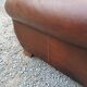 Paire de fauteuils club en cuir brun des années 30