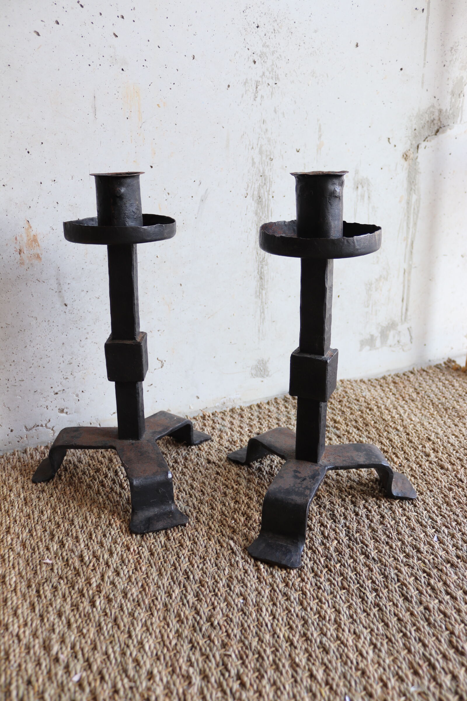 Pair of large brutalist cast iron candlesticks from the 50s