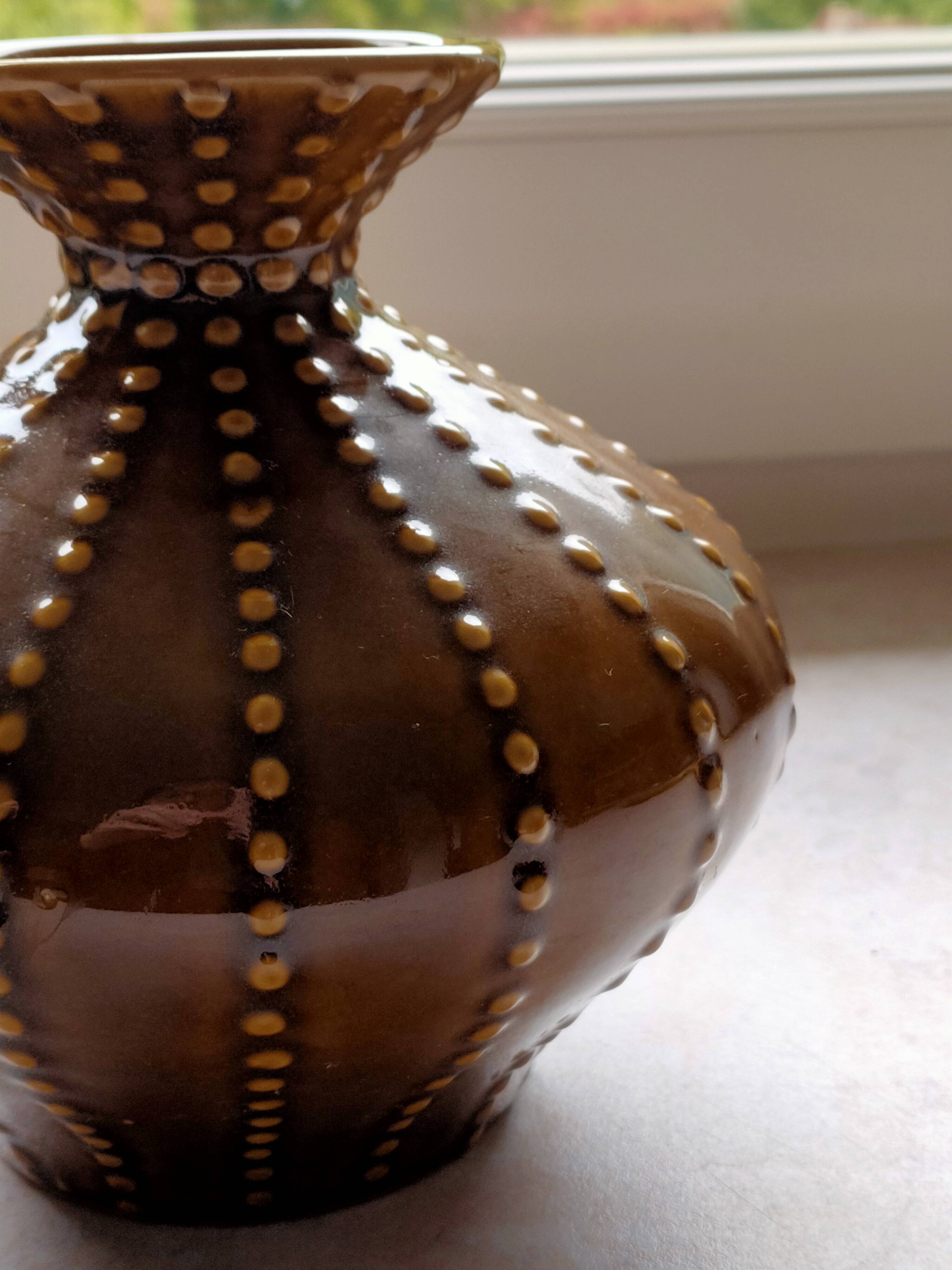 Pear-shaped ceramic vase.