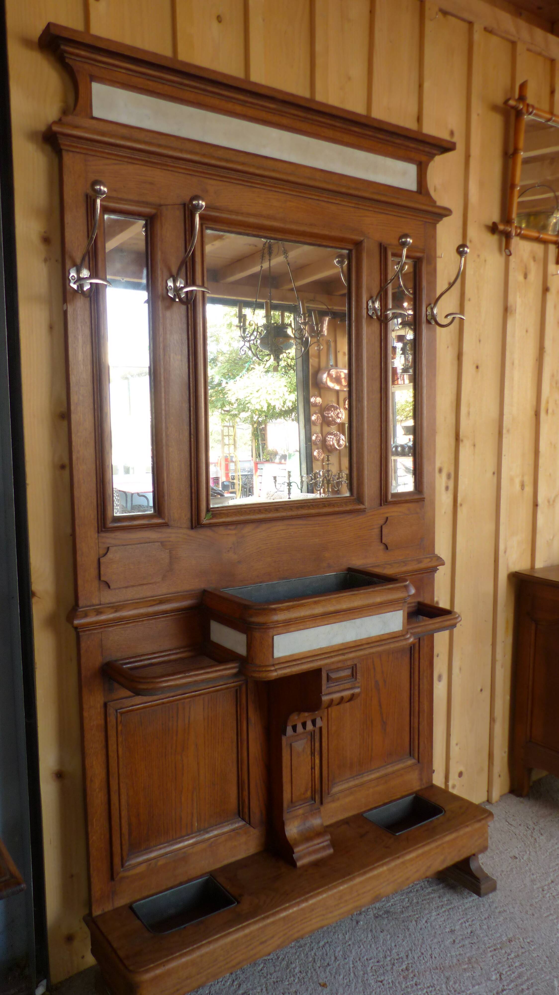 Oak and marble wall coat sores door