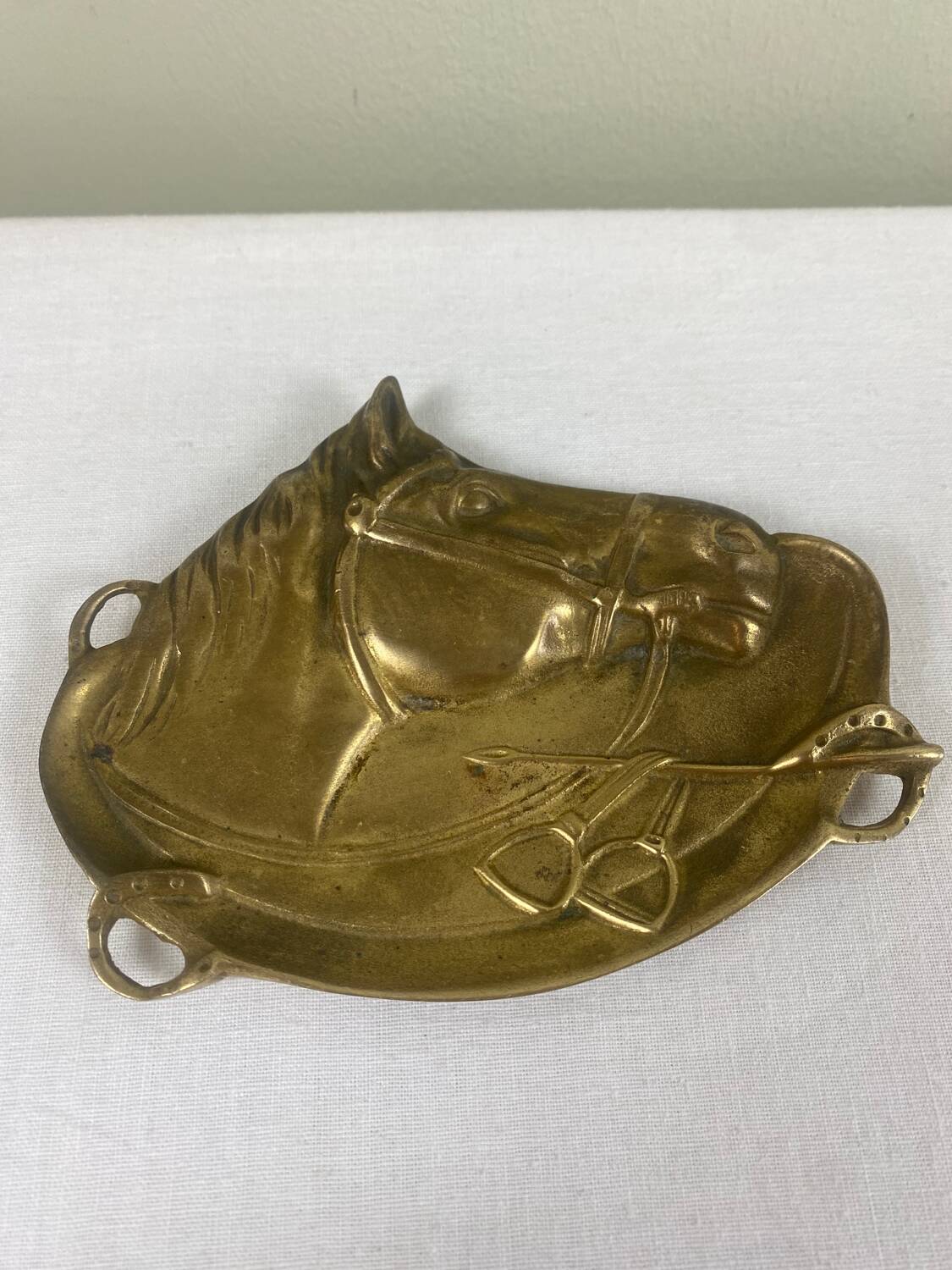 Antique brass pocket emptier