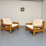 Set of 2 armchairs in solid pine with boucle fabric, 1970s Scandinavian design.