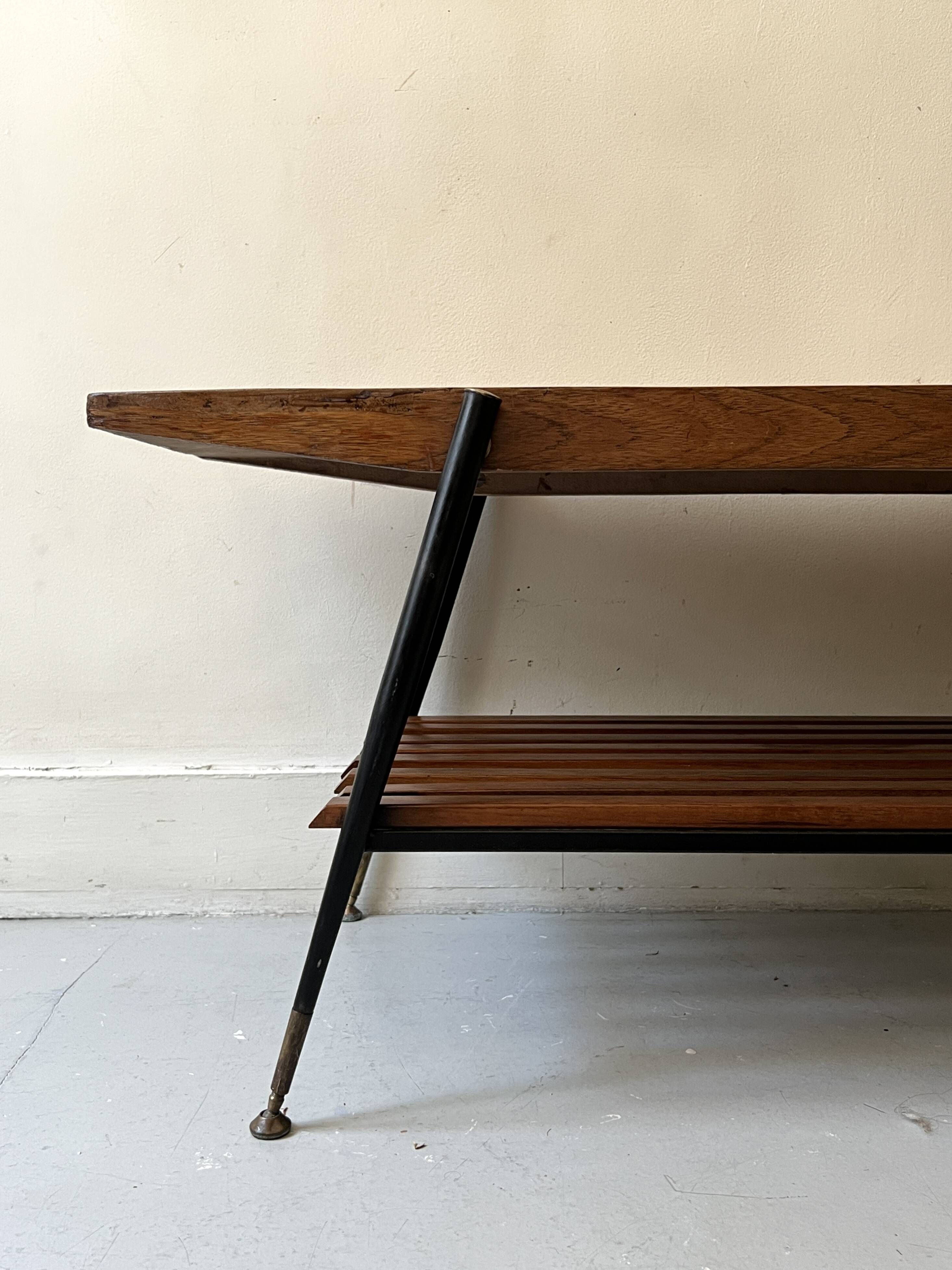 Mid-century coffee table with 2 mahogany wood tops and brass detail, Italy.