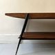 Mid-century coffee table with 2 mahogany wood tops and brass detail, Italy.