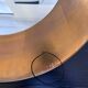 Gold oval mirror