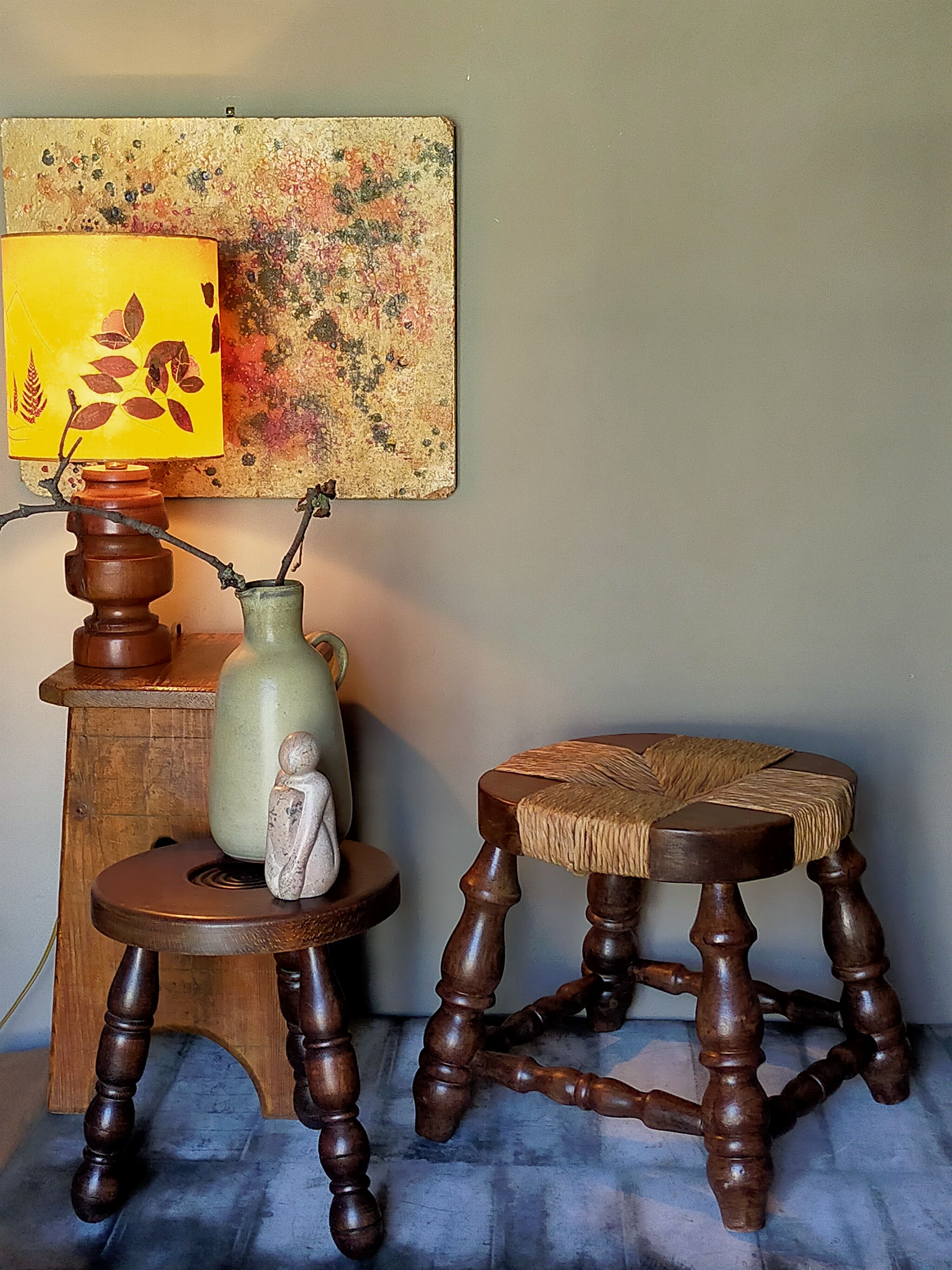 Low vintage regional stool in solid wood with straw top
