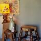 Low vintage regional stool in solid wood with straw top