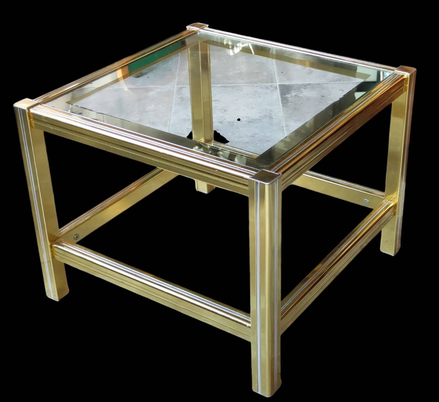 Small designer coffee table in gold metal