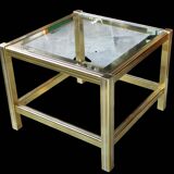Small designer coffee table in gold metal