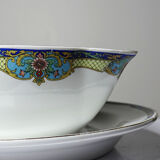 Old Lunéville sauce boat, opaque porcelain with polychrome decoration.