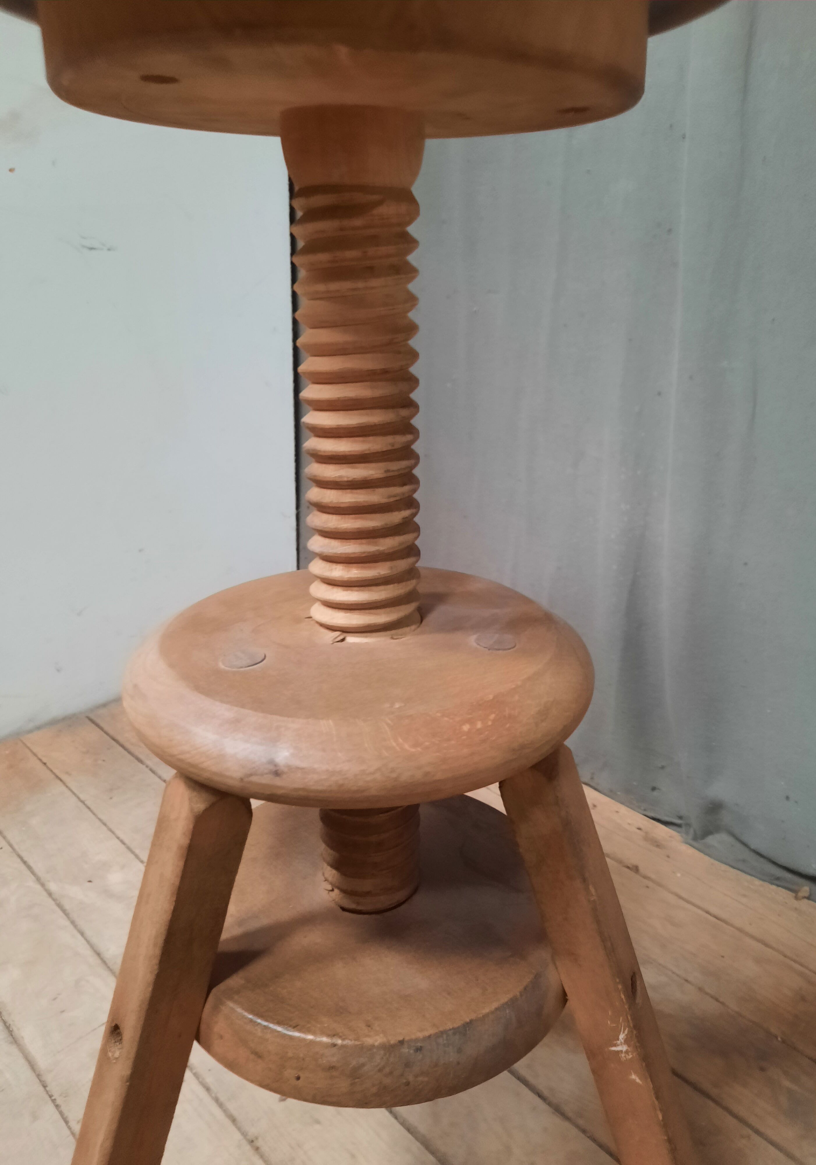 Wooden stool with screws