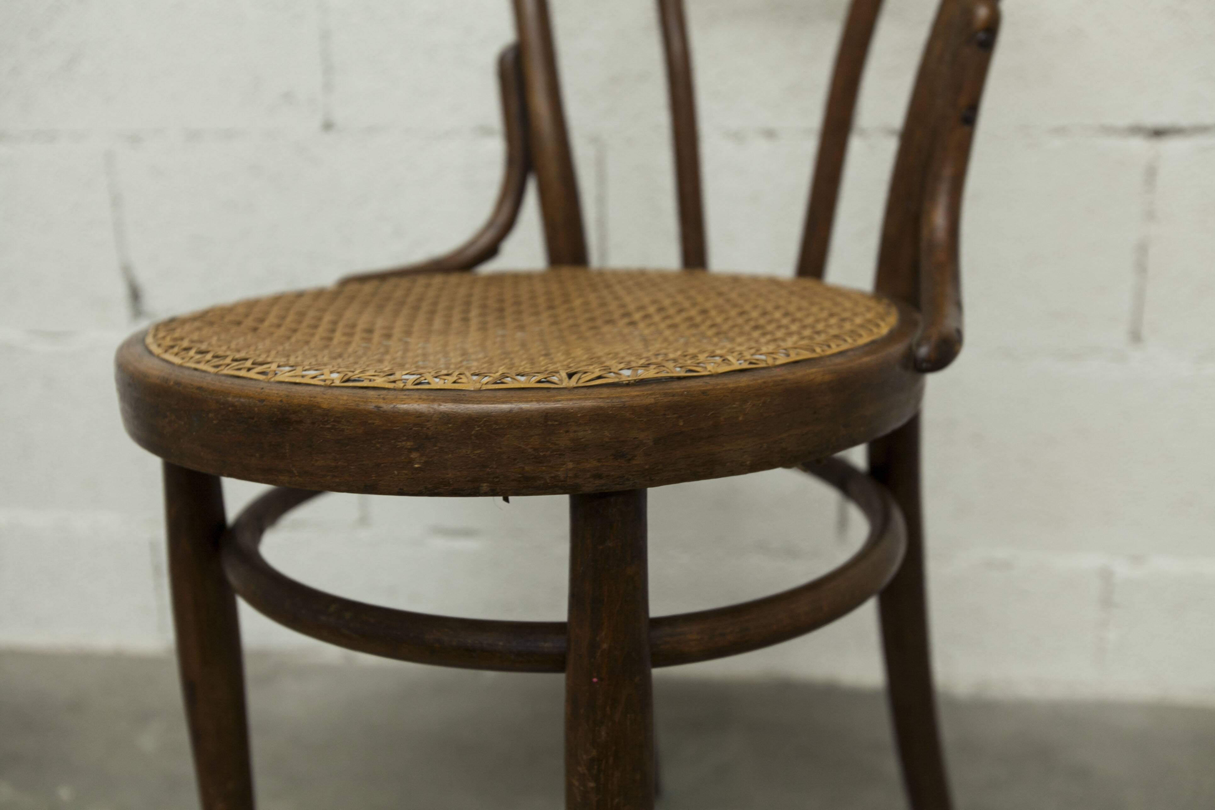 1920s curved wooden cane bistro chair