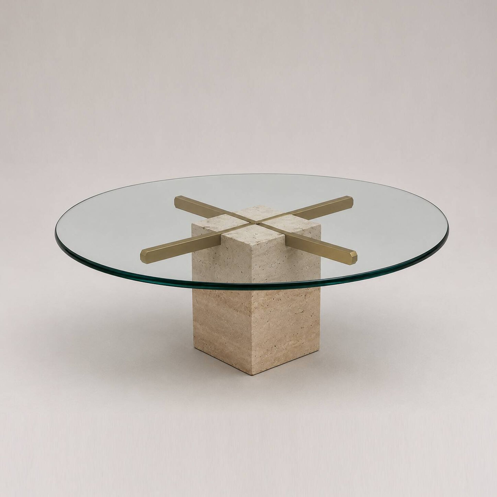 Vintage round coffee table with thick glass top and travertine and brass base