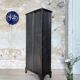 Strafor double-door corrugated iron cloakroom, circa 1920.