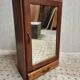 Old hanging cupboard medicine cabinet with mirror and drawer