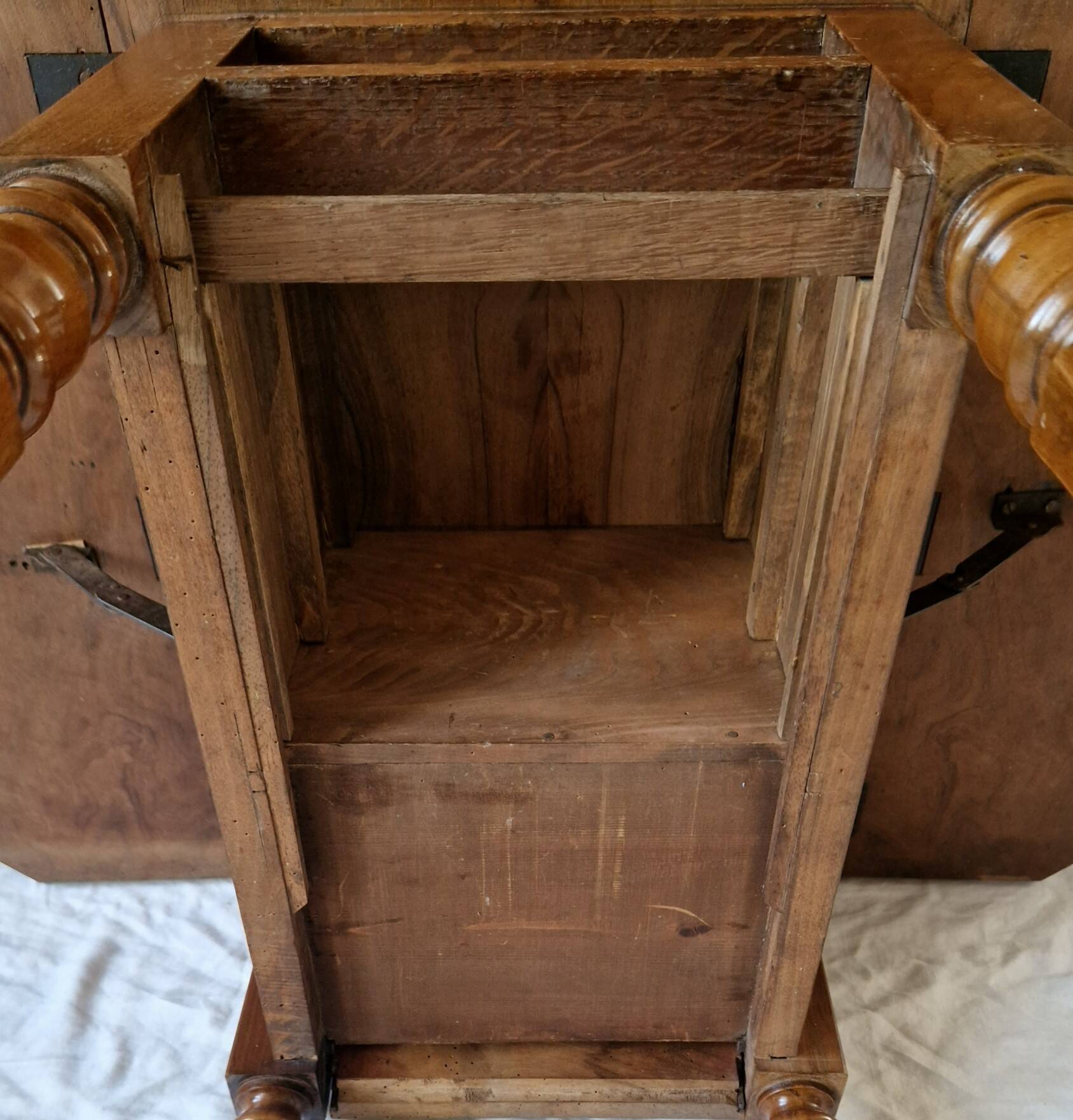 Nineteenth-century walnut work table with flaps, large storage + secret drawer.