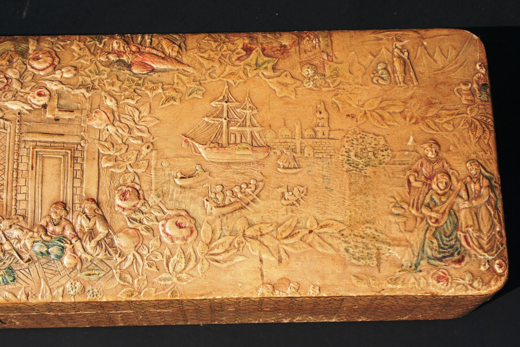Old embossed leather glove box decorated scenes