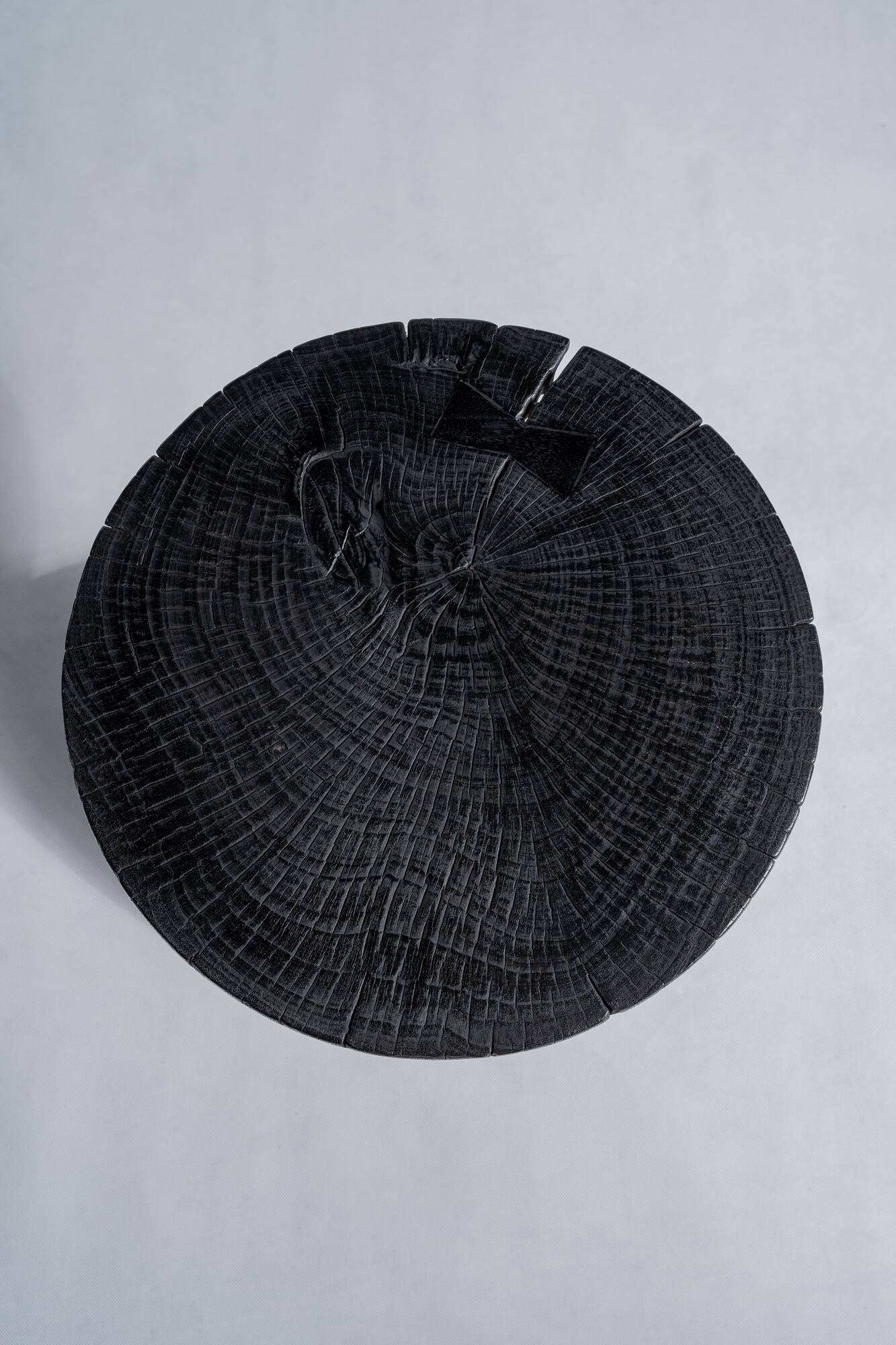 Solid wood (monoxyl) side table, organic shape, black color