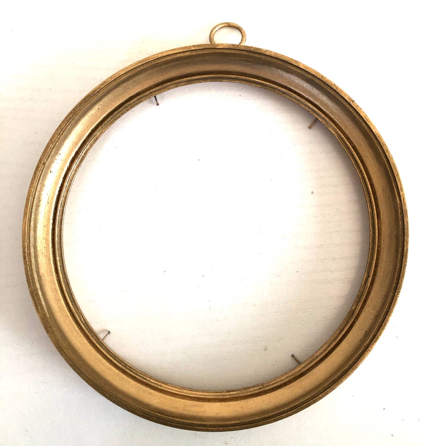 Round golden wood frame