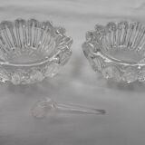 Antique crystal salt and pepper shakers, with their small spoon