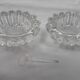 Antique crystal salt and pepper shakers, with their small spoon
