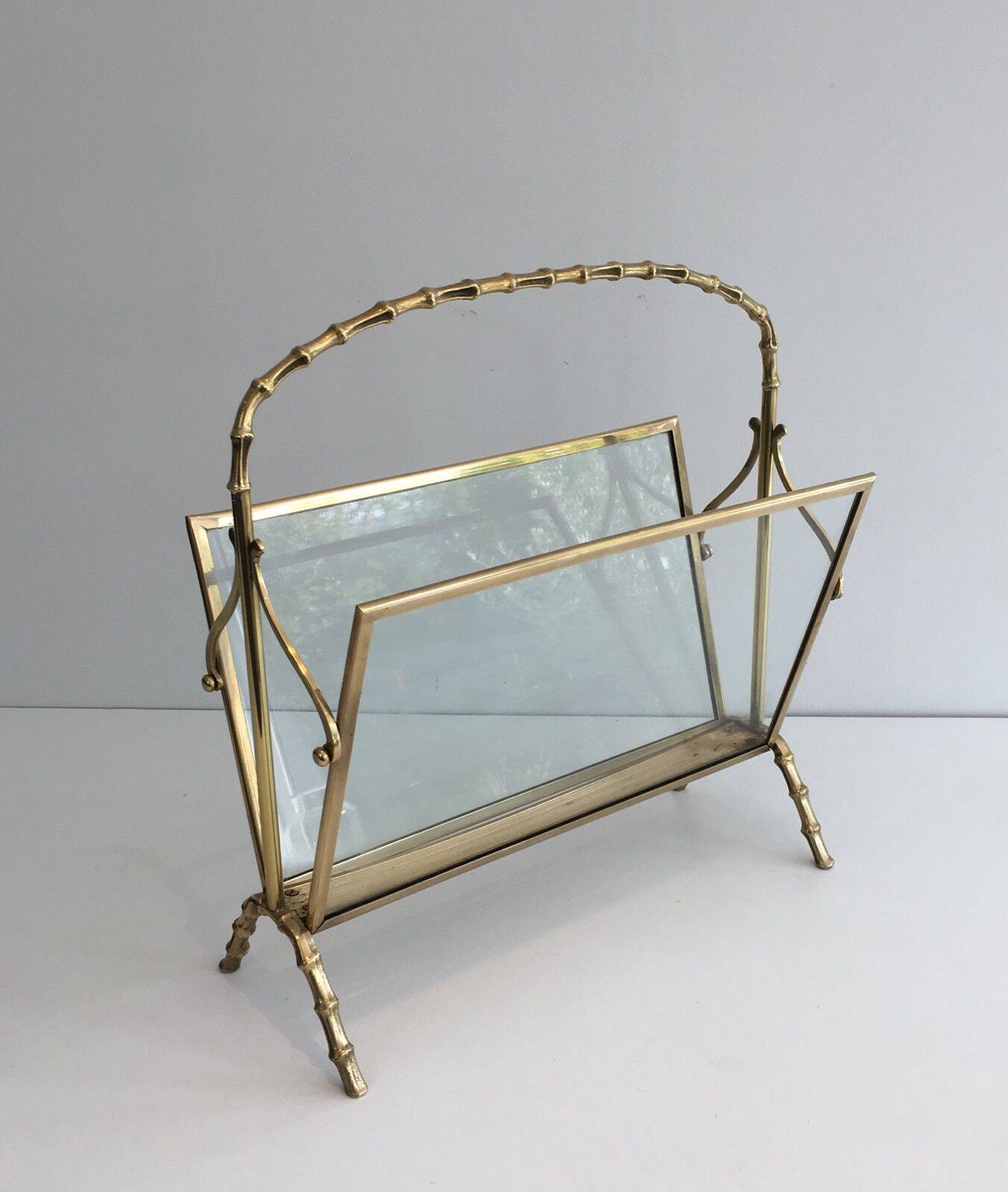 Bamboo-style brass magazine rack from the Baguès house.